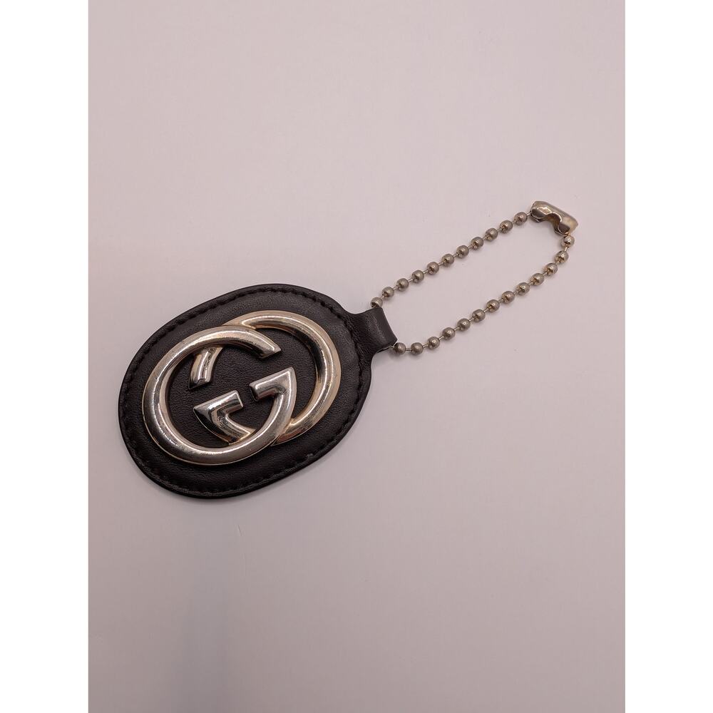 Gucci Interlocking GG Leather Oval Keychain Bag Charm Black Silvery Gold Tone - Picture 2 of 6